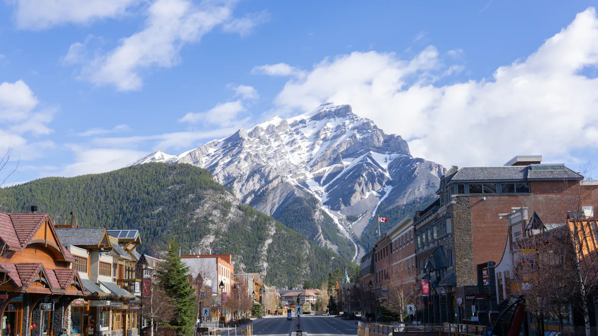 Small Canadian town with mountains behind it